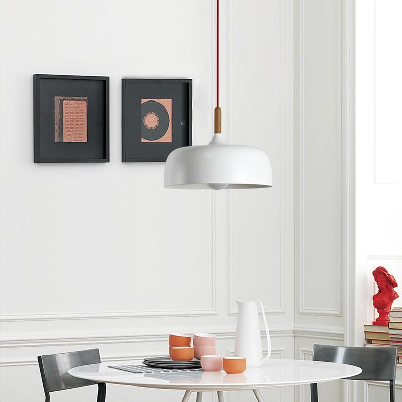 White Leilani pendant light over modern dining table.