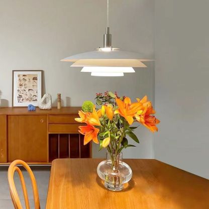Nordic pendant light over dining table with lilies. Carins Cluster Nordic Pendant Light Living Room Kitchen