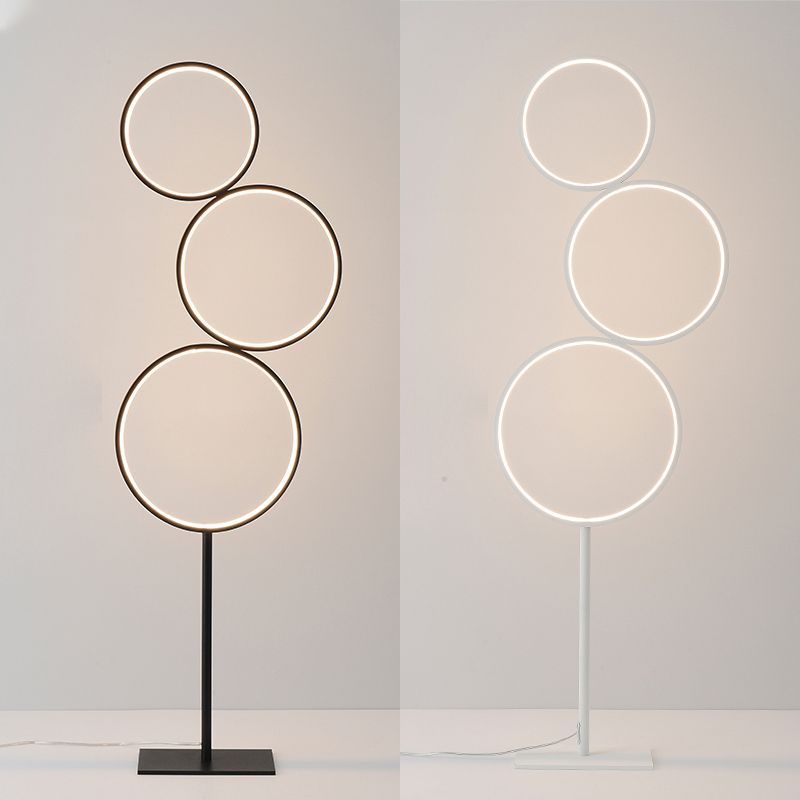 Arisha Nordic Ring Floor Lamps: Black and White models.