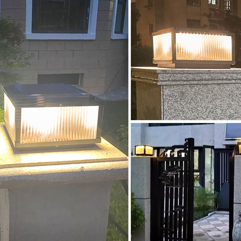 Riley Modern Outdoor Pillar Light illuminating at night