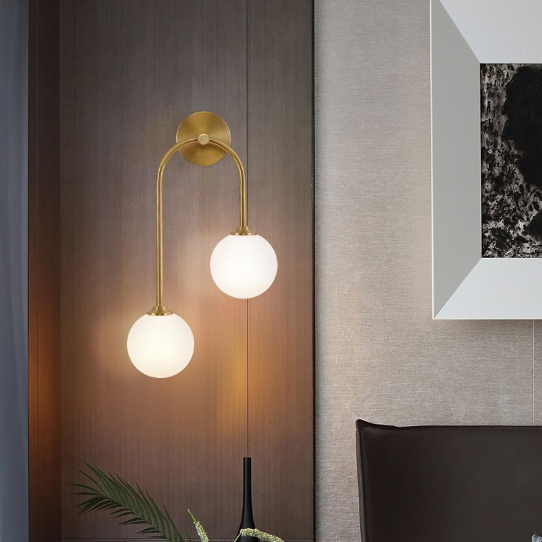Valentina brass wall lamp with globe shades