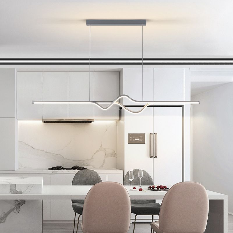 Modern Louise pendant light over dining area