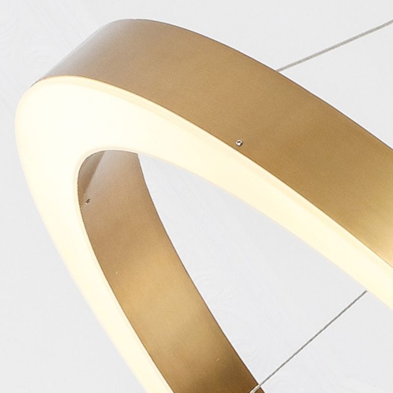 Arisha gold ring LED pendant light close-up.