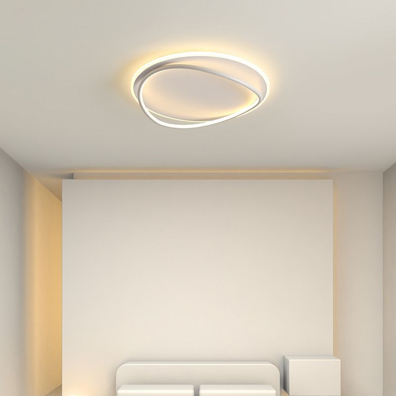 Modern Quinn Ceiling Light illuminating a minimalist bedroom