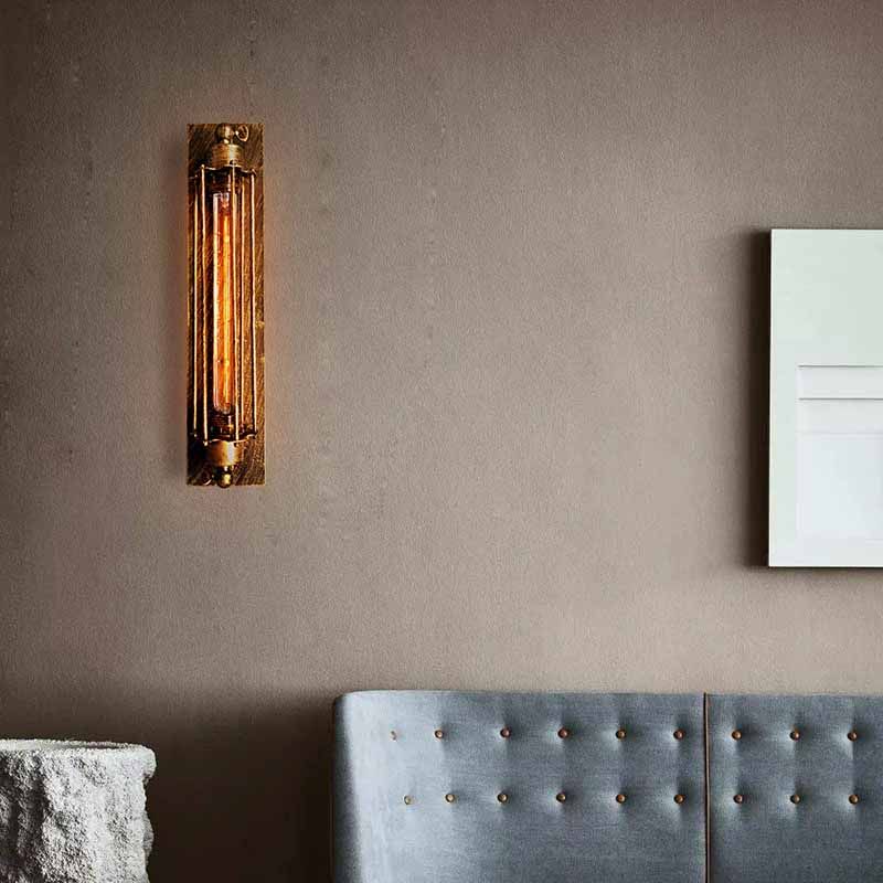 Alessio Vintage Metal Wall Lamp lighting a room.