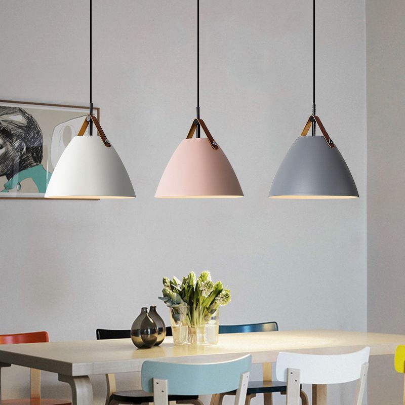 Morandi color pendant lights over dining table