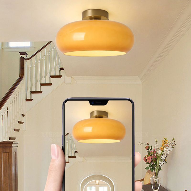 Amber glass Hailie flush mount ceiling light in hallway