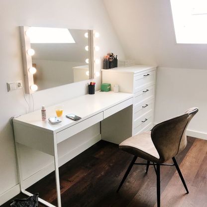 Modern vanity setup with metal wall lamp