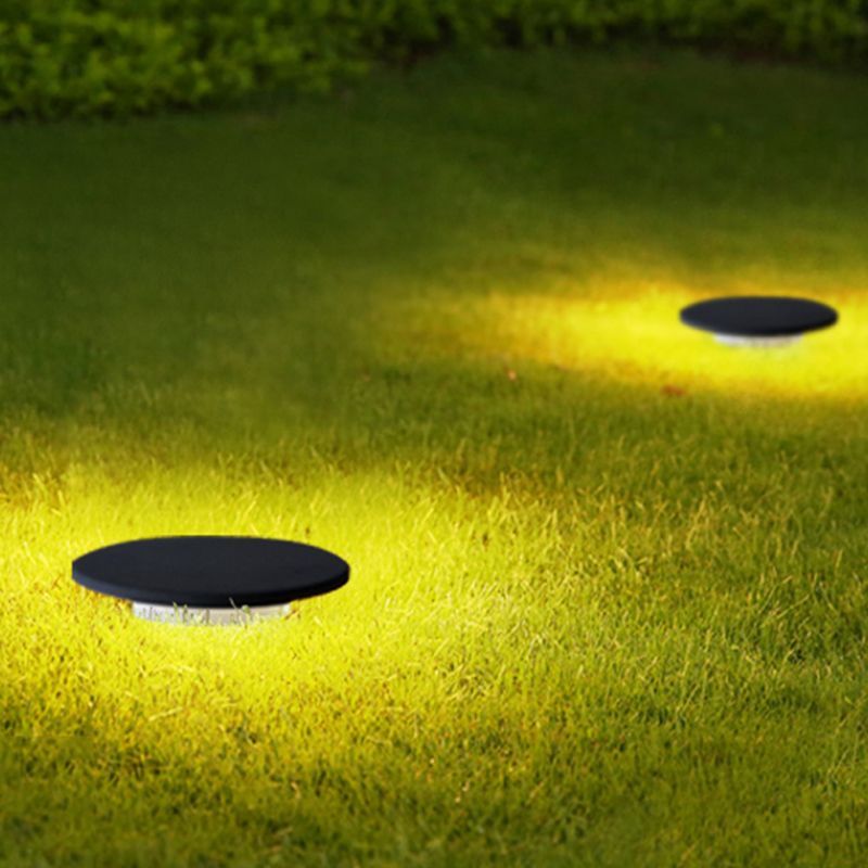Pena solar lights illuminating a lawn