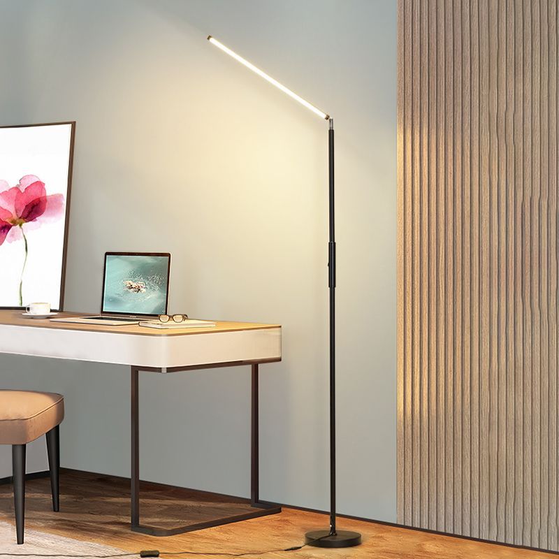 Modern Edge Floor Lamp illuminating home office, desk setting