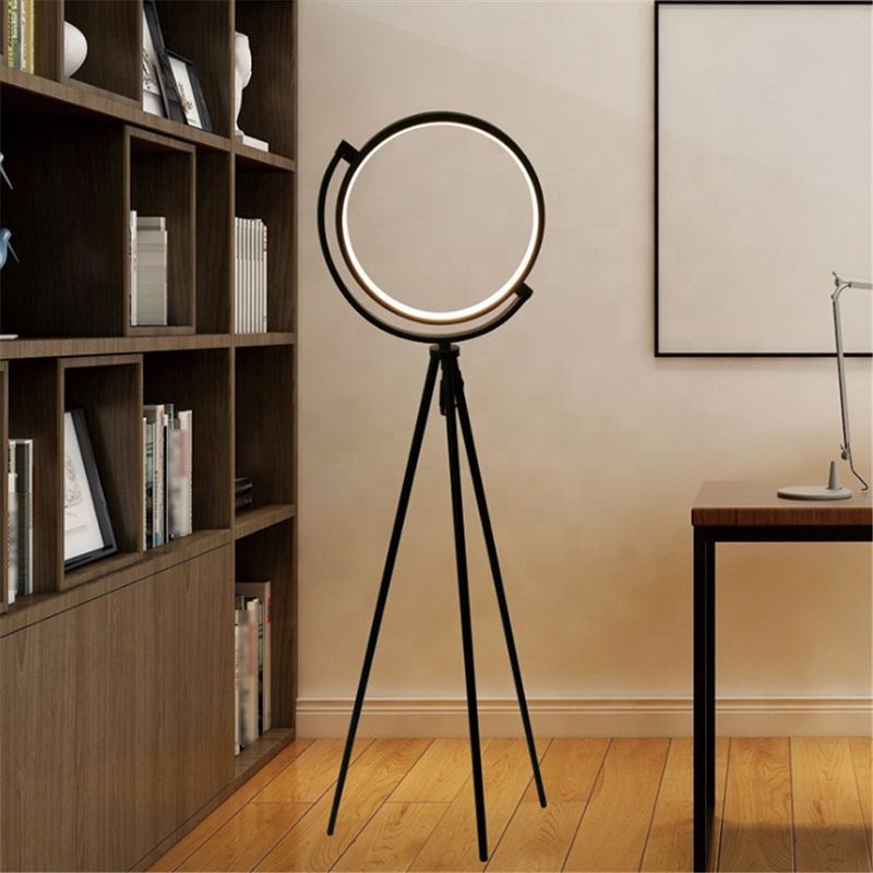 Salgado Modern Circle Tripod Floor Lamp in a contemporary living room setting