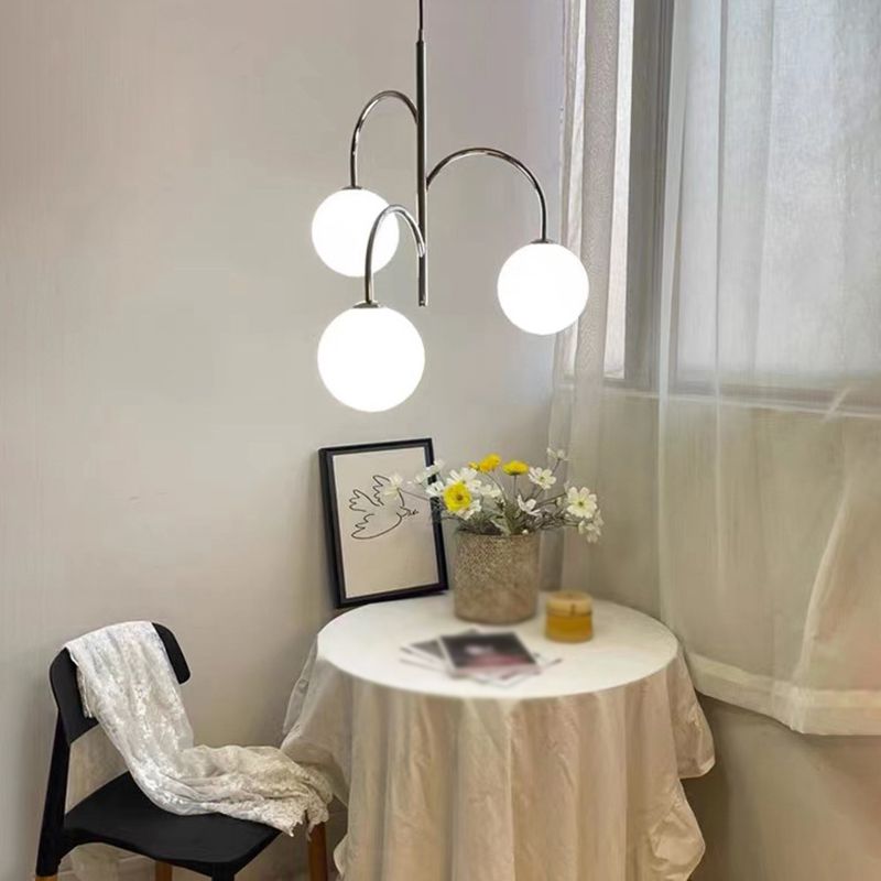 Chrome 3-light pendant. Modern dining room lighting by Las Sola.