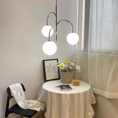 Chrome 3-light pendant. Modern dining room lighting by Las Sola.