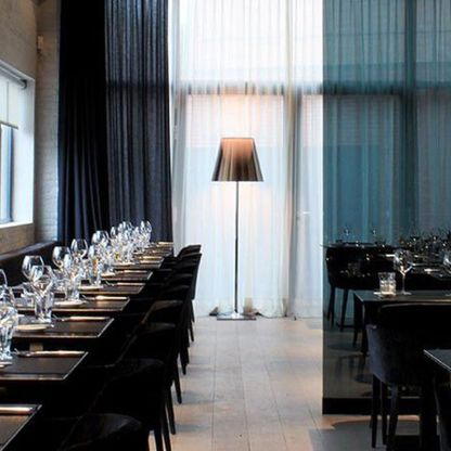 Eryn Dome floor lamp in modern restaurant setting.