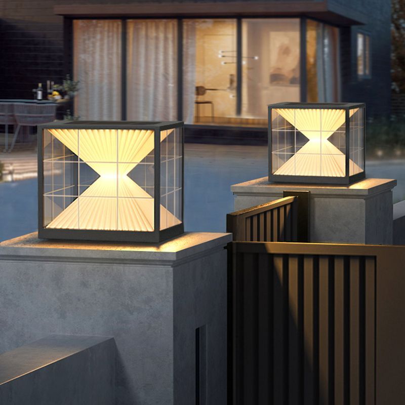 Riley Pyramid Outdoor Pillar Lights illuminating a pathway