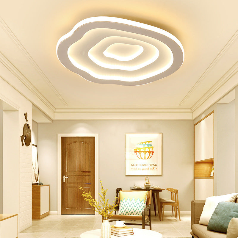 Modern minimalist Quinn Ripple ceiling light fixture in living room