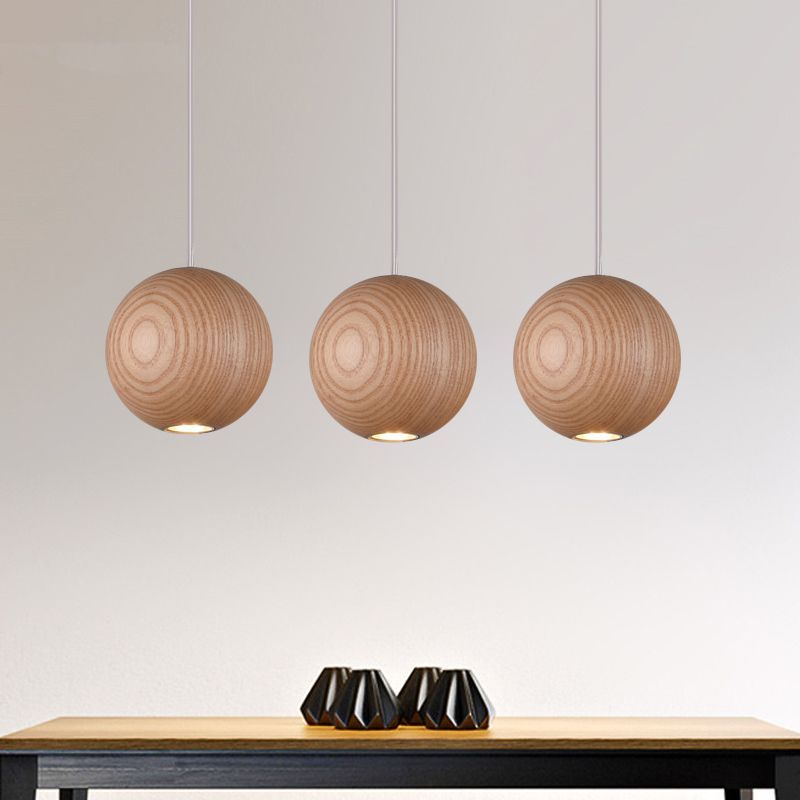 Ozawa wood pendant lights over a wooden table