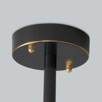 Evette pendant light canopy detail, black and gold finish