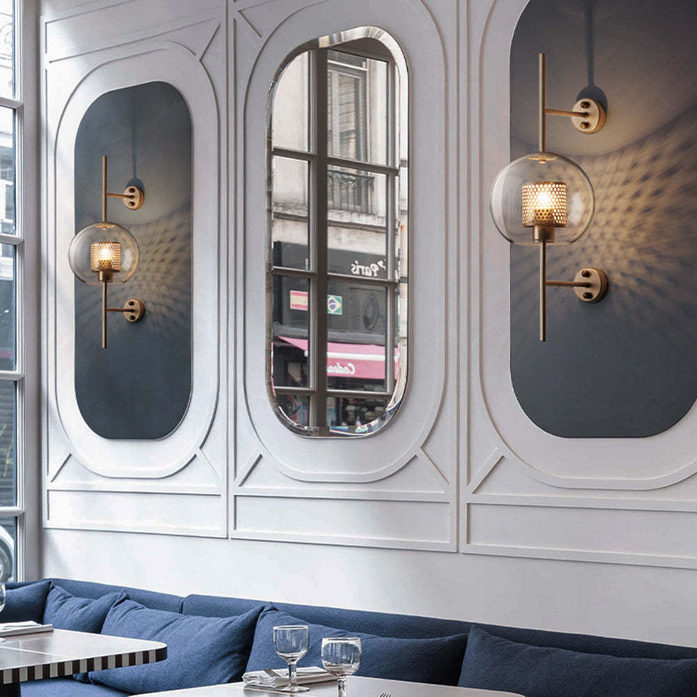 Glass globe wall lamps in a restaurant setting