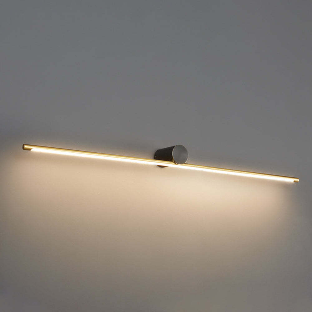 Leigh Minimalist Linear Wall Lamp, gold finish, illuminating.