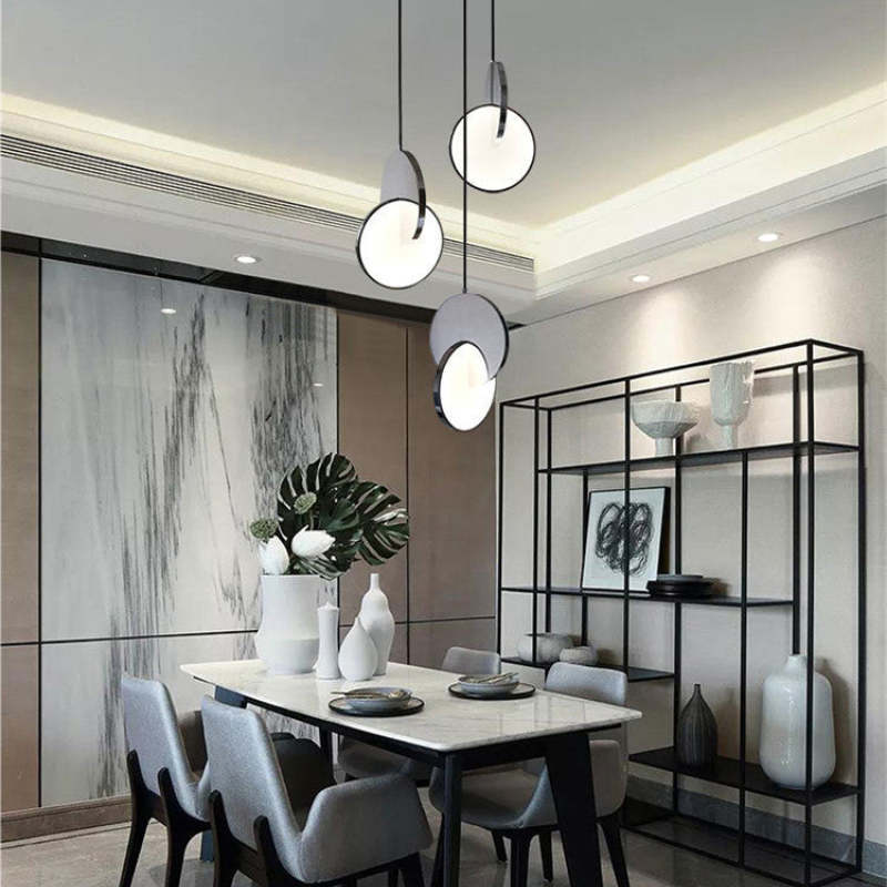 Welsh Pendant Light Disc in modern dining room setting, contemporary design