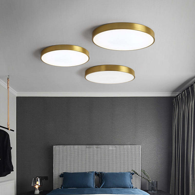 Bedroom illuminated by Quinn Nordic LED flush mount ceiling lights
