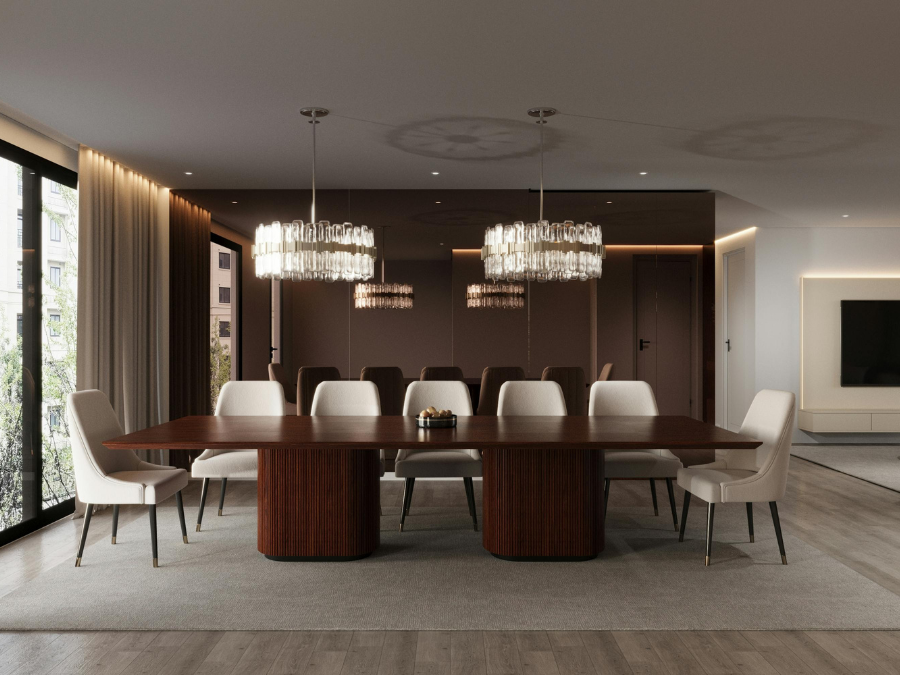 Elegant dining room featuring two modern crystal chandeliers.