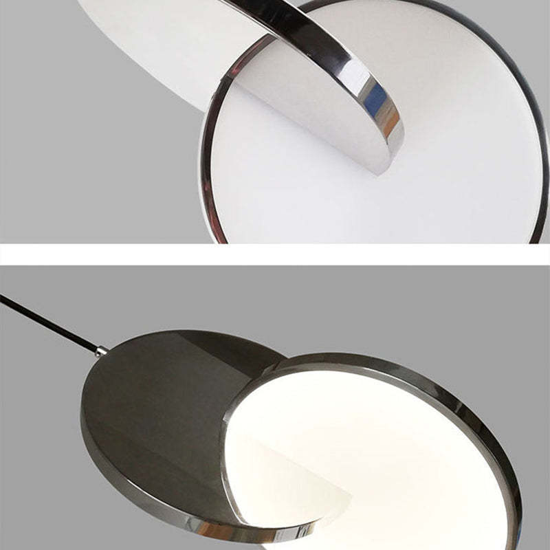 Welsh Pendant Light Disc Detail: Metal ring and disc lighting.