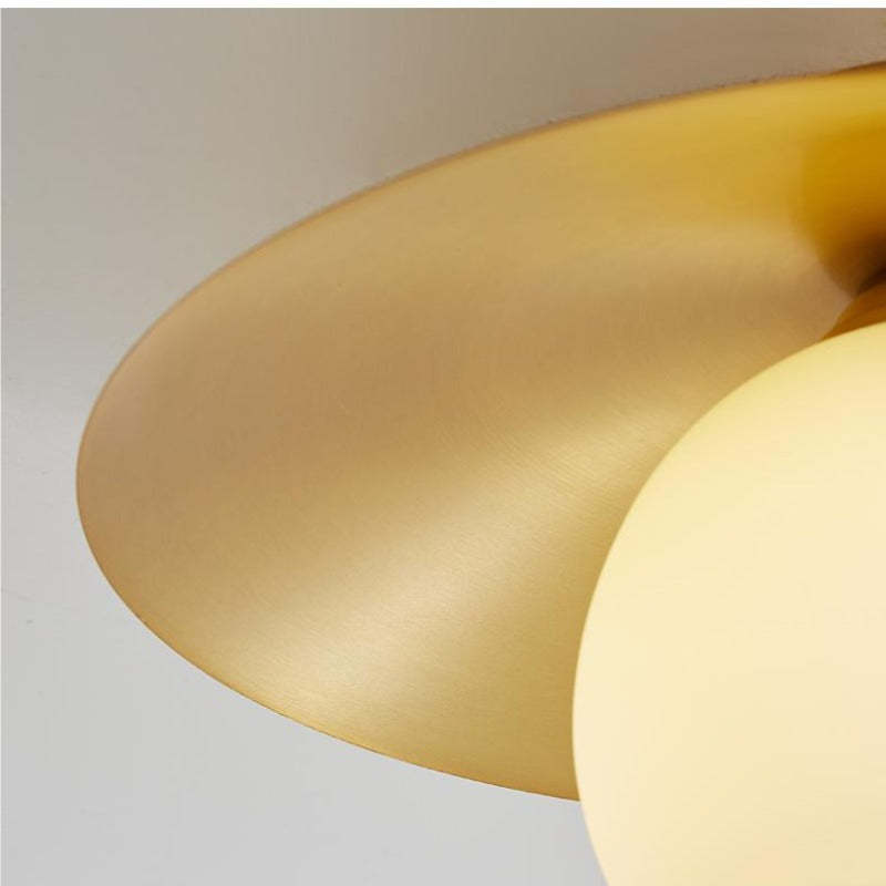 Close-up Carins Nordic Retro Ceiling Light - Golden Plate and Bulb