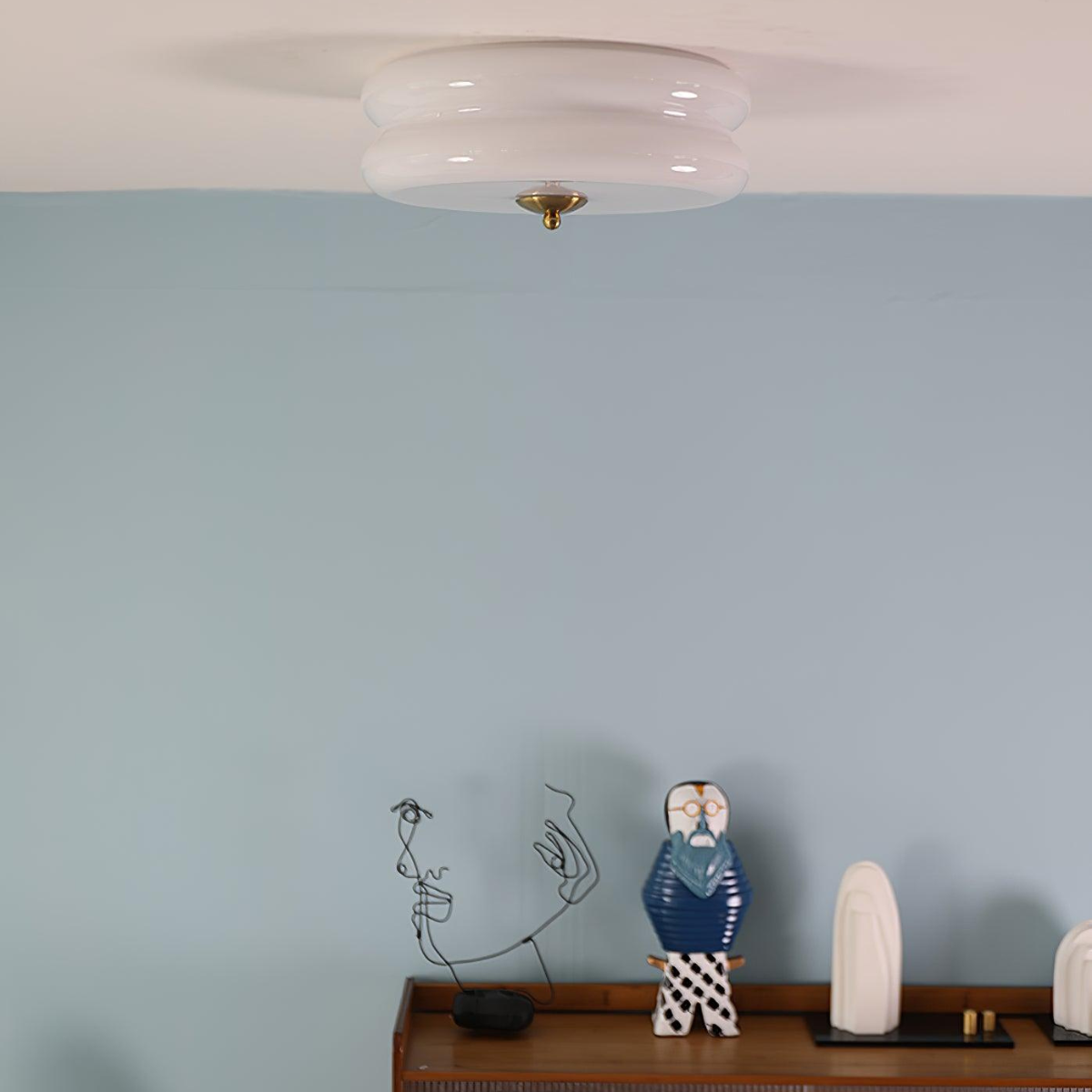 Modern round flush mount ceiling light in bedroom setting