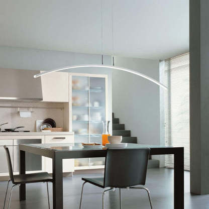 Modern kitchen with Edge curved linear pendant light.