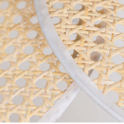Rattan pendant light detail with white trim