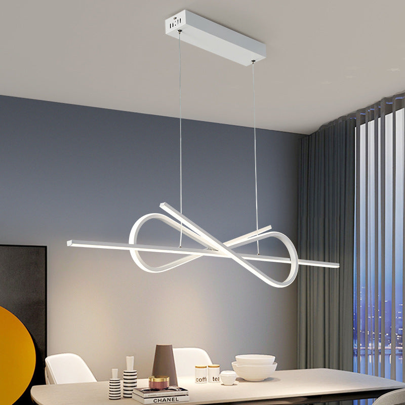 Bouvet bow-tie pendant light over dining table