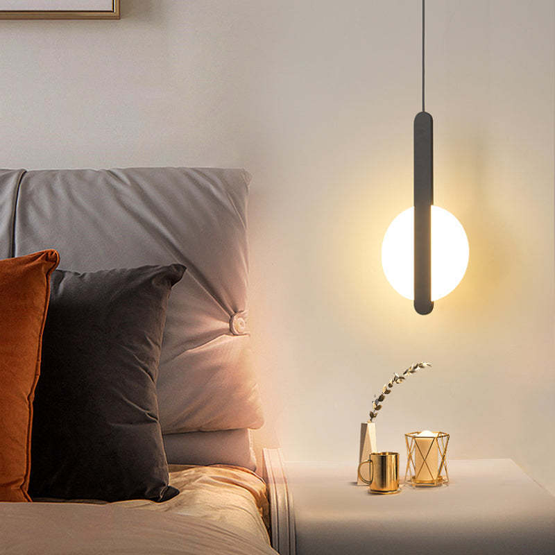 Nyla LED pendant light illuminating a bedroom scene