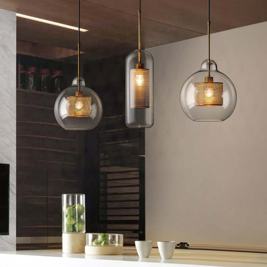 Modern pendant lights with glass shades and golden accents