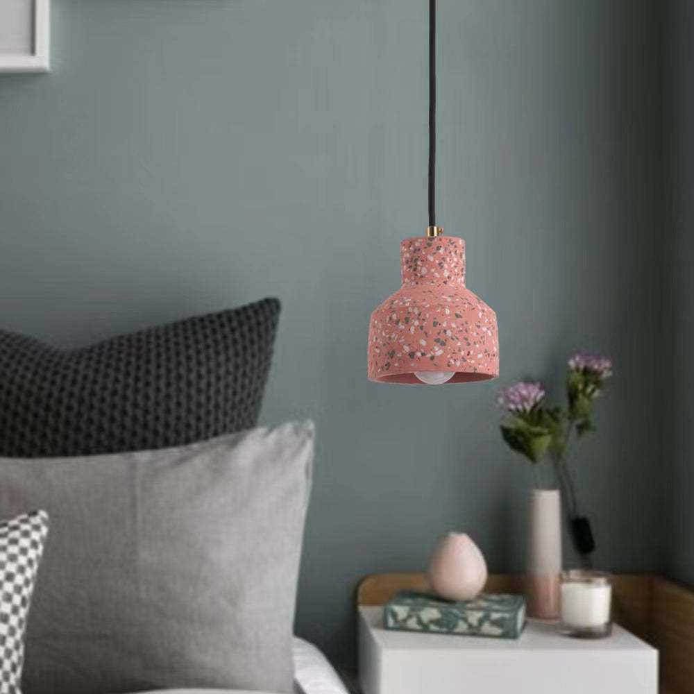 Pink Morandi Pendant Light above a bedroom nightstand