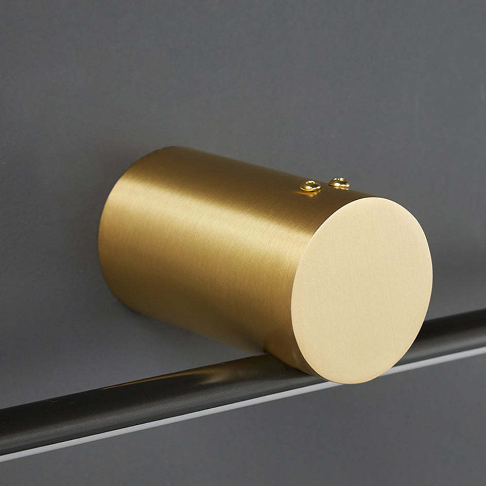 Close-up of Leigh Wall Lamp cylindrical gold fixture