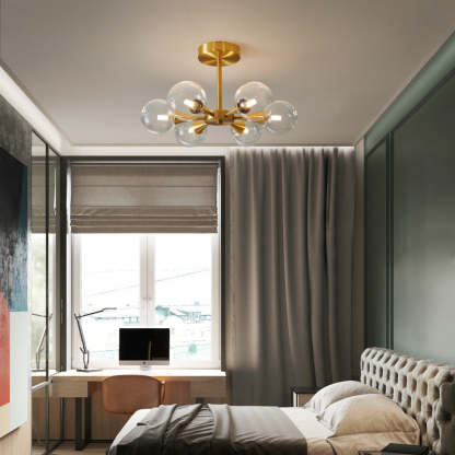 Valentina Pendant Light over modern bedroom, brass and glass.