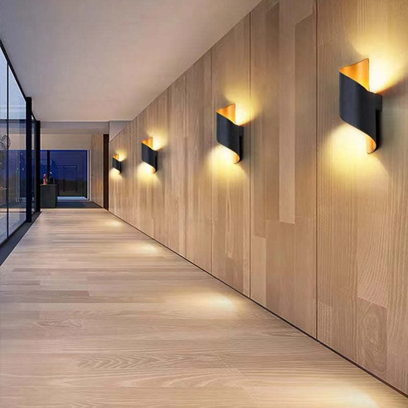 Orr conch wall lamps illuminate modern hallway.