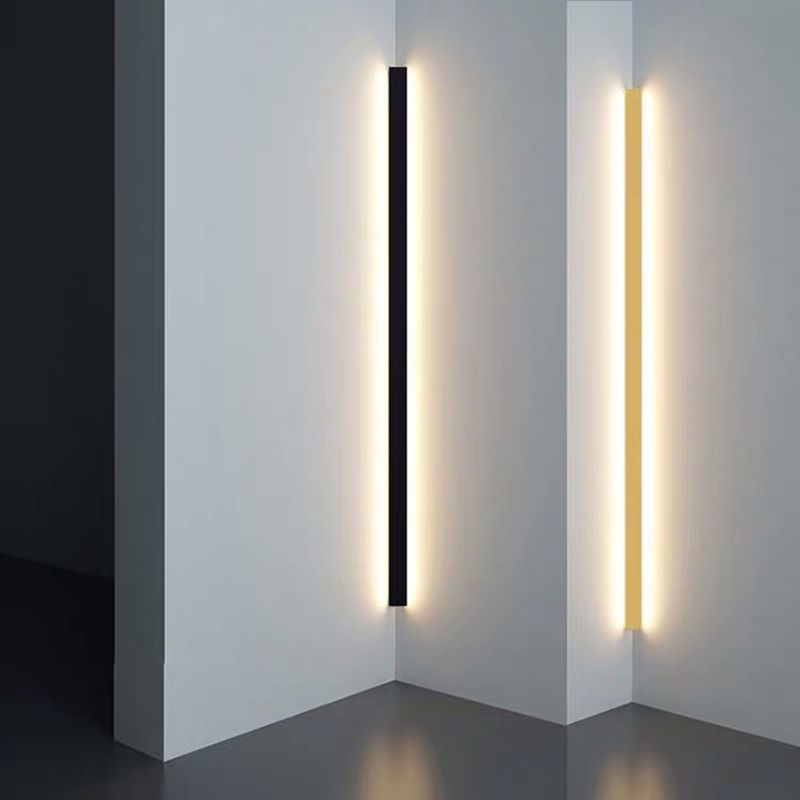 Minimalist Linear Wall Lamp. Modern corner lighting design, featuring black and gold finishes.