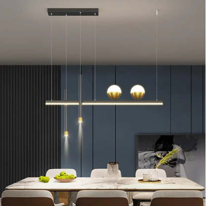 Modern pendant light fixture over dining table