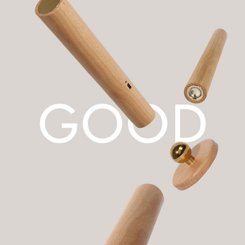 Deconstructed Ozawa wood wall lamp with magnetic connector, 'GOOD' text.