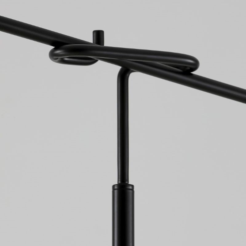 Carins Floor Lamp: Black metal adjustable arm detail