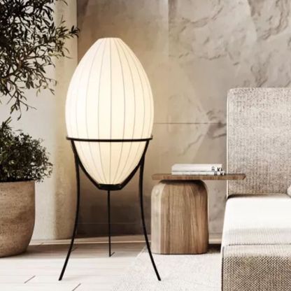 Renée modern floor lamp in a cozy living room setting