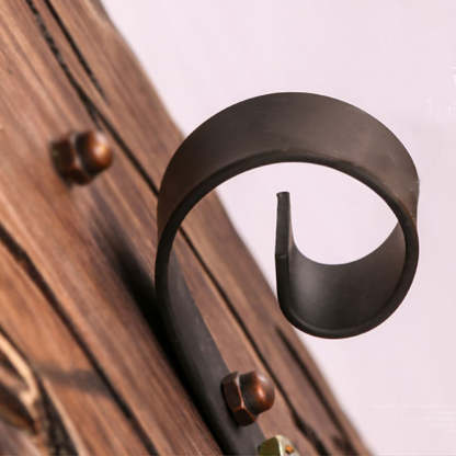 Close-up of Austin pendant light's wood and metal detail.