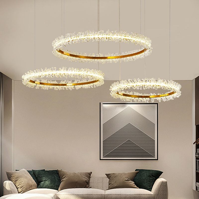 Luxury crystal ring pendant lights in a living room