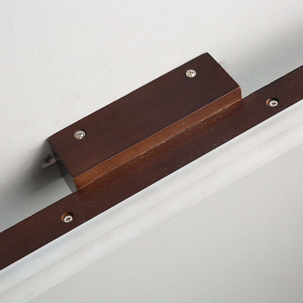 Walnut Leigh wood wall lamp mount detail.