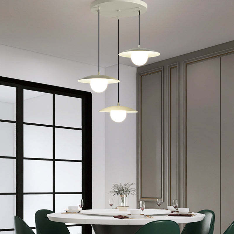 Morandi pendant light over dining table, modern interior