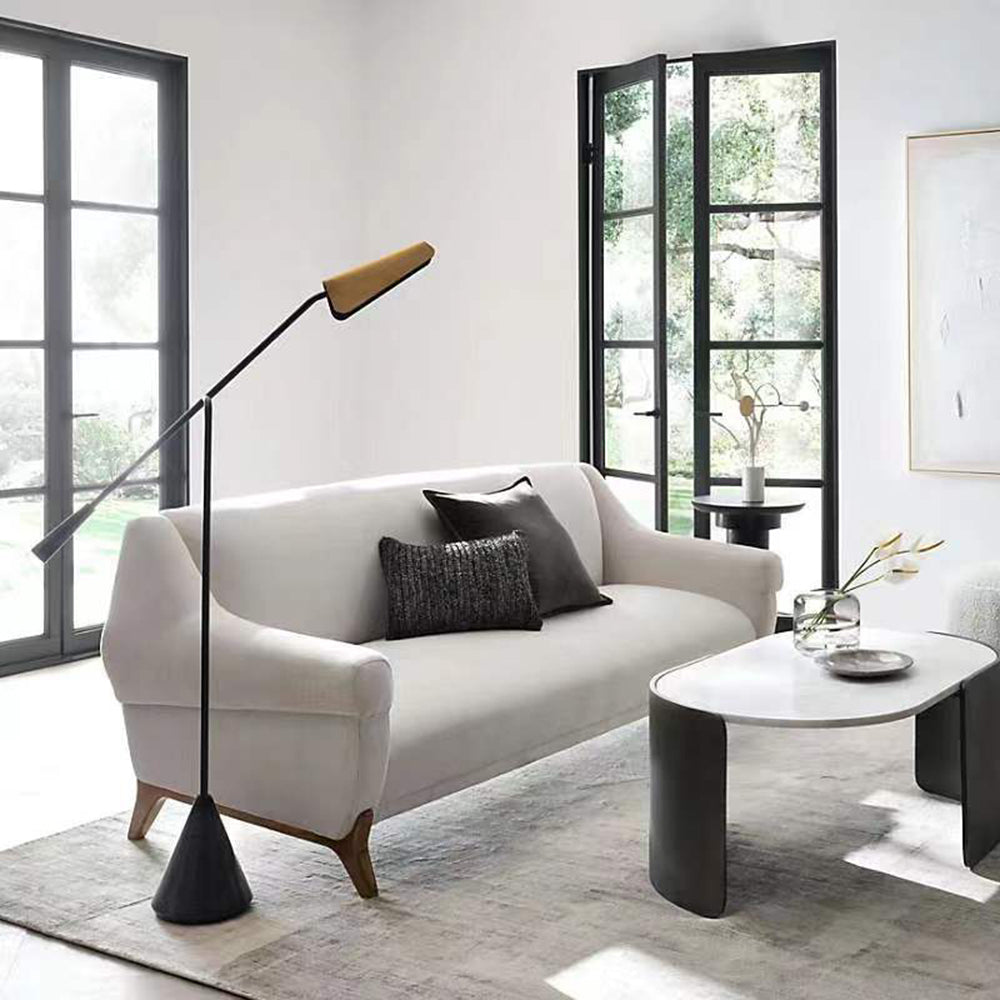 Salgado LED floor lamp illuminating living room