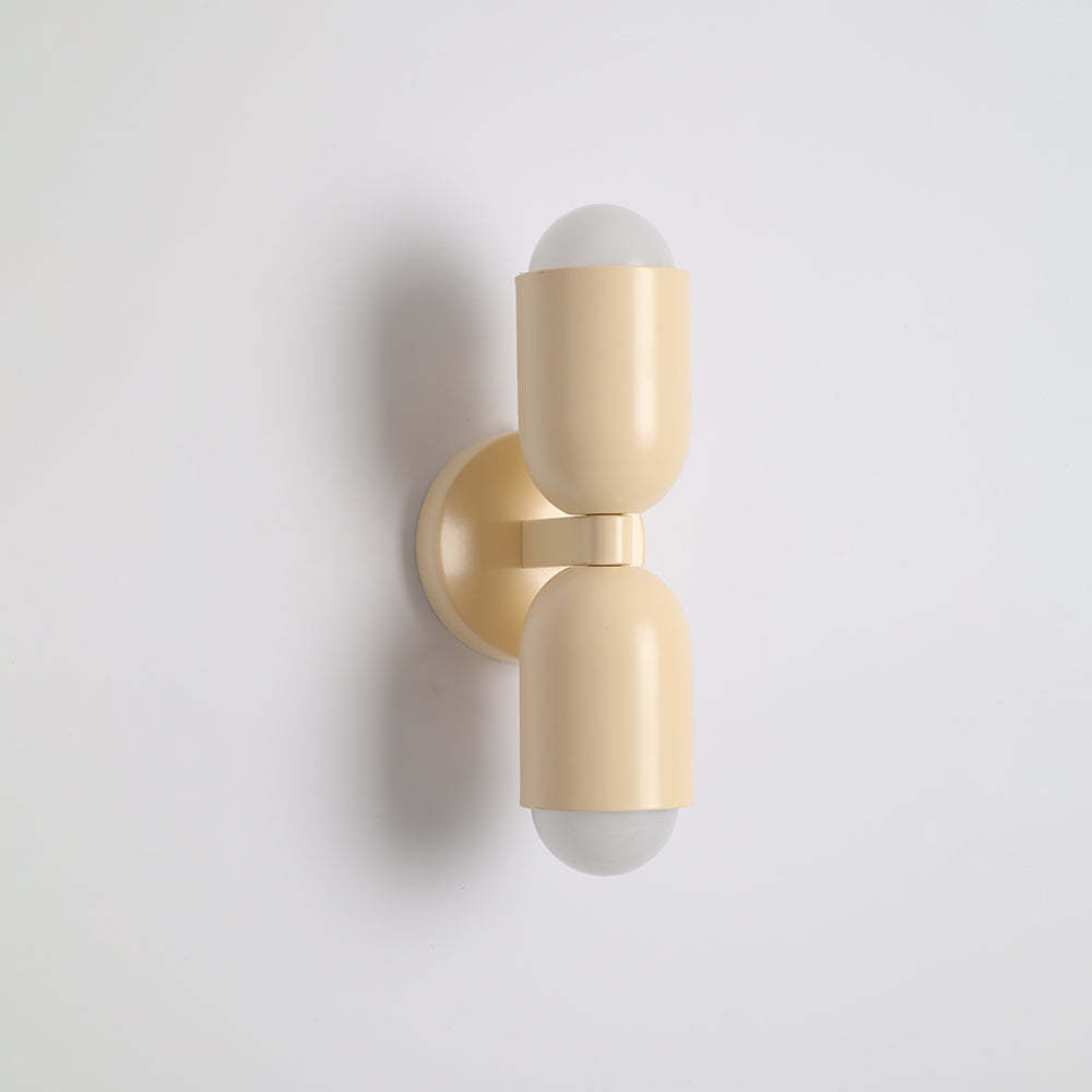 Yellow Morandi wall lamp: Modern artistic lighting fixture.
